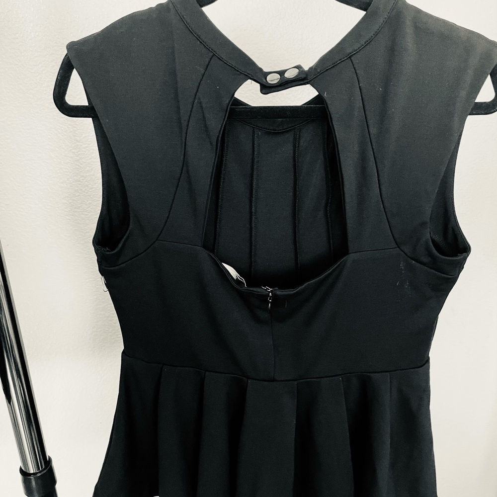 Black Sleeveless Peplum Top